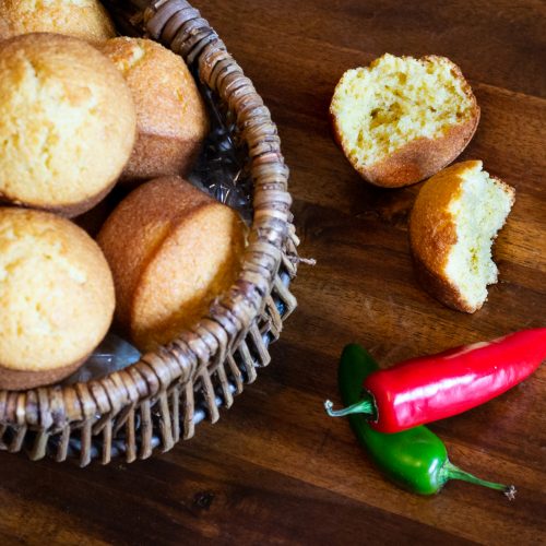 Cornbread muffins made with buttermilk served in a basket